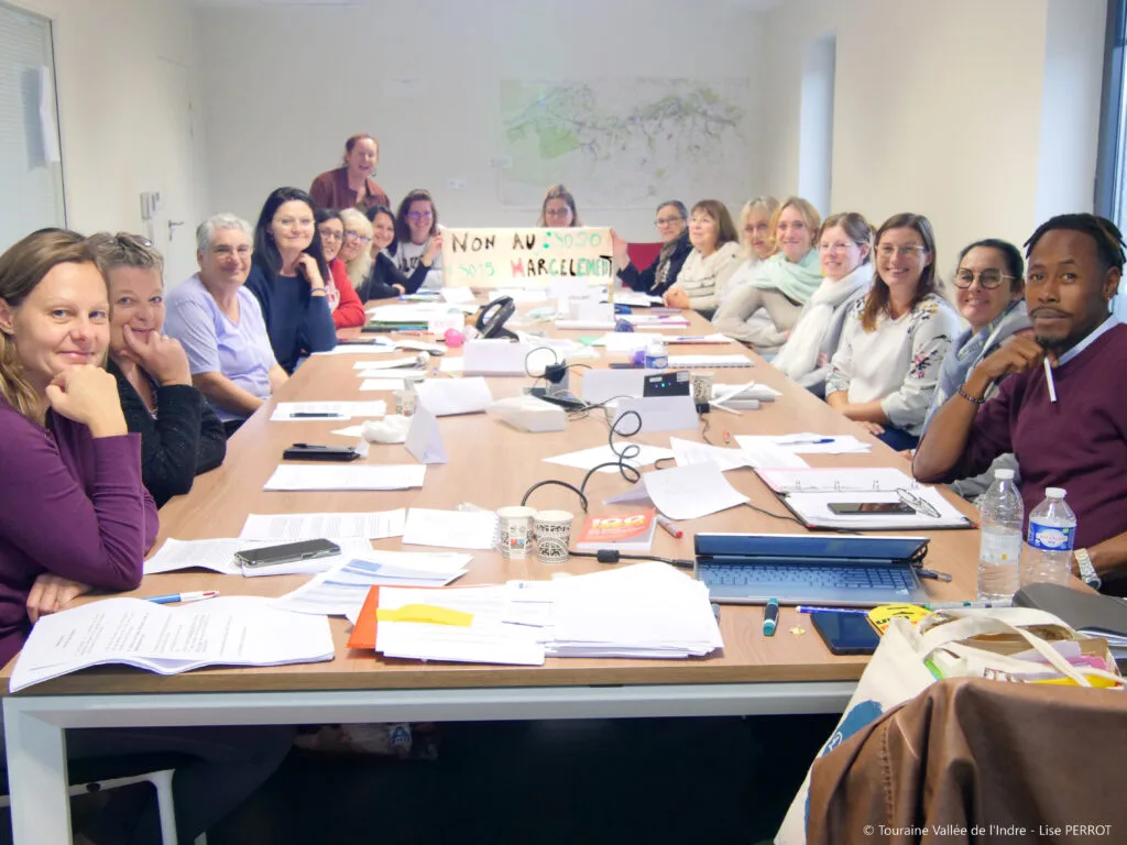 Photo des 18 participants ainsi que la formatrice.