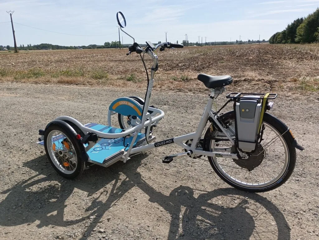Vélo pour transporter un fauteuil roulant